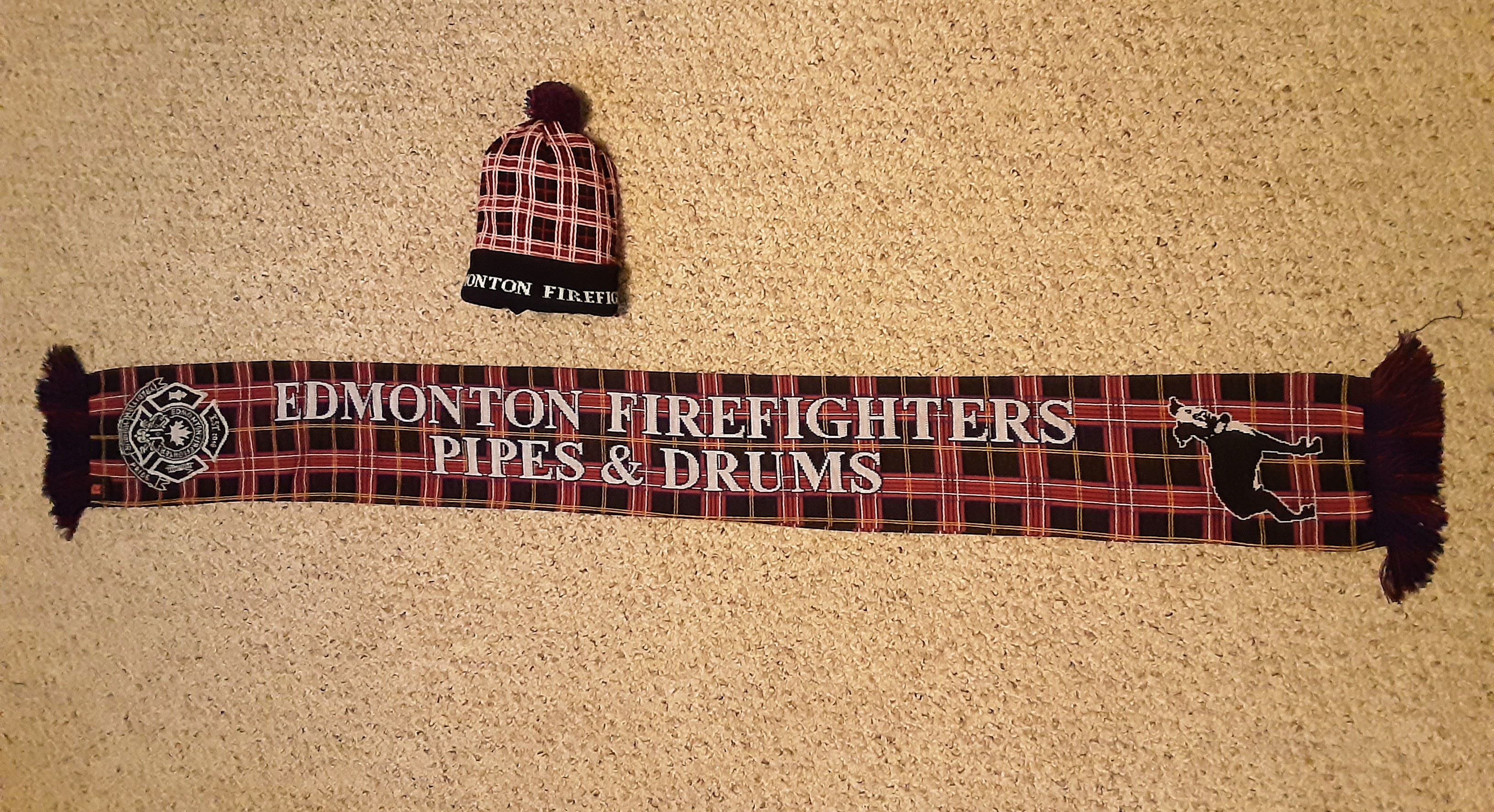 The Edmonton Firefighters Piping and Drumming Society is now selling Toques and Scarves as part of our fundraising initiatives.